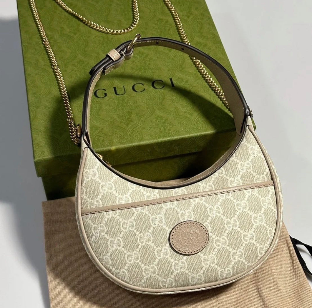 Gucci GG half-moon-shaped mini bag